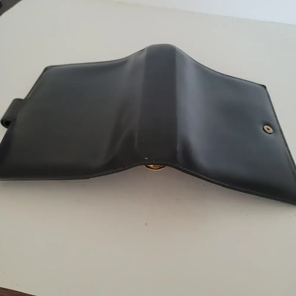 Cartier Black Leather Planner with Gold Panther Accent